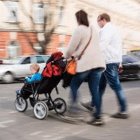 Family with stroller © Volodymyr Baleha | Shutterstock 
