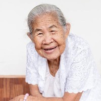 Smiling elderly woman in Thailand © nafterphoto/Shutterstock 